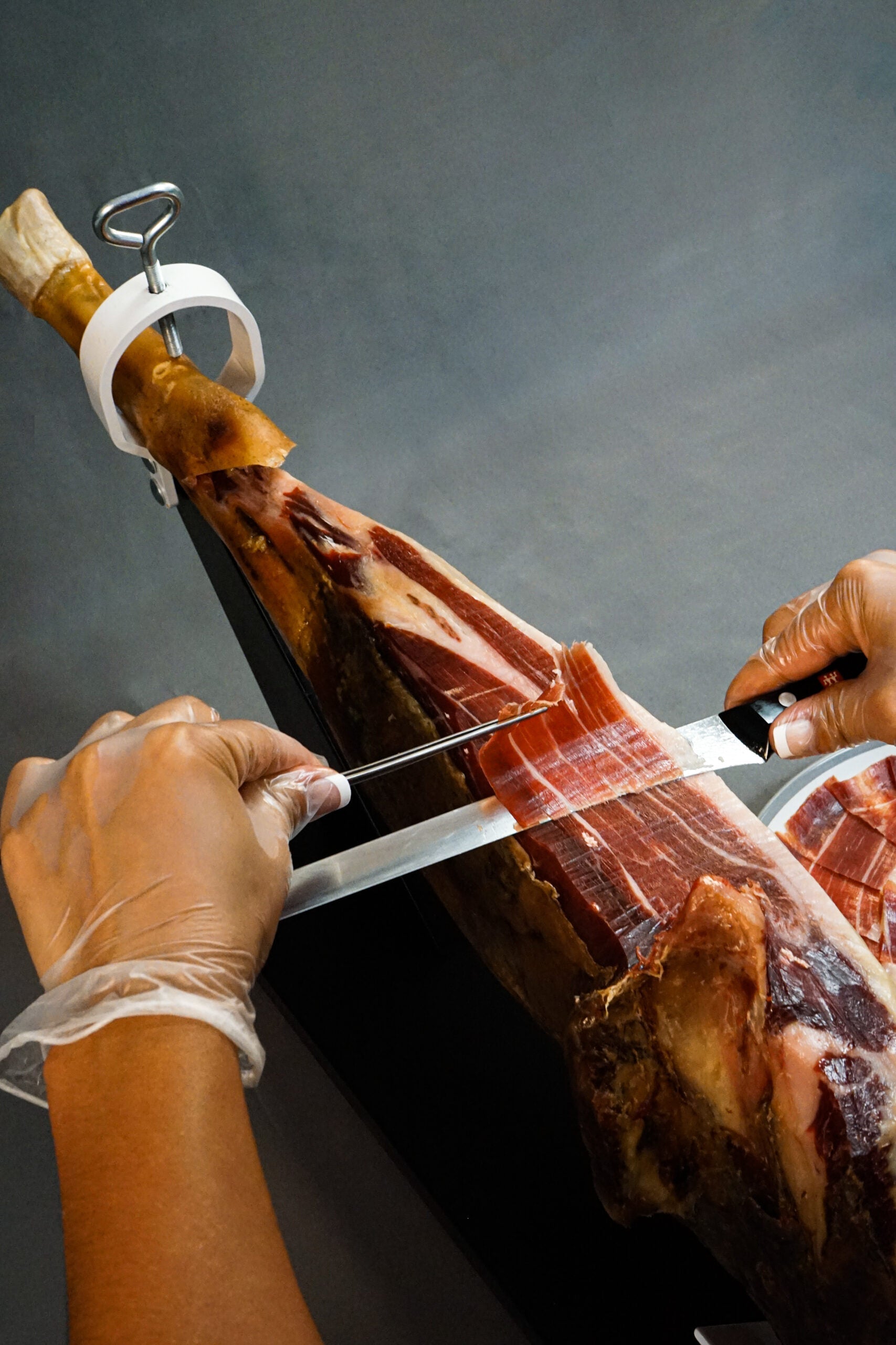 ham shoulder being sliced
