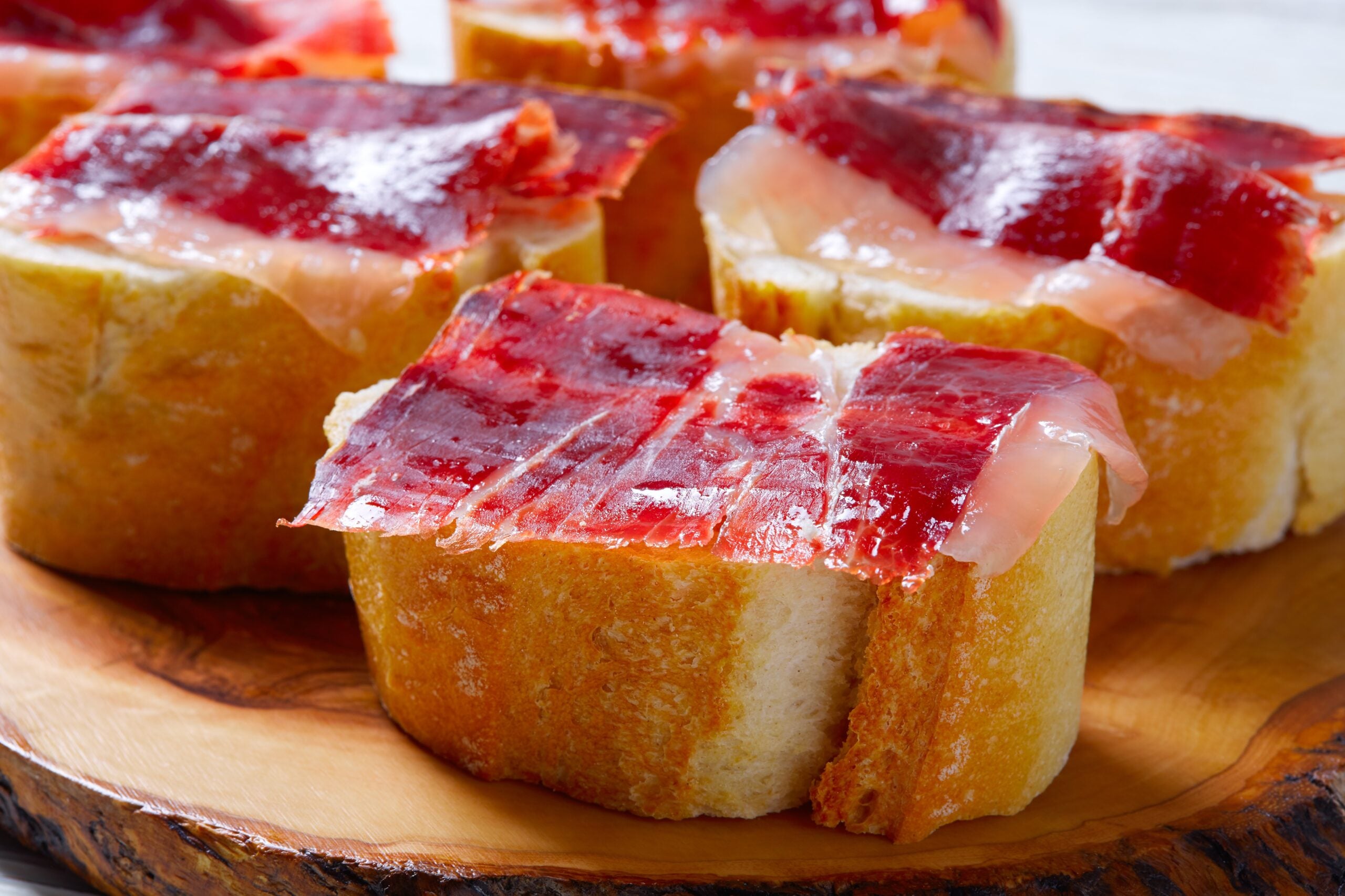  Close up Serrano Ham Shoulder cut slices on bread